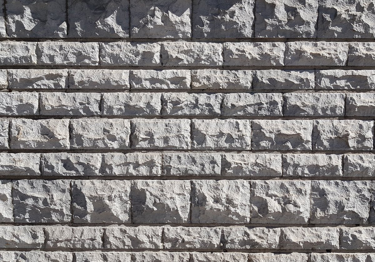 La partie décorative en pierre de la façade de l'immeuble Setec La partie décorative en pierre de la façade de l'immeuble Setec
